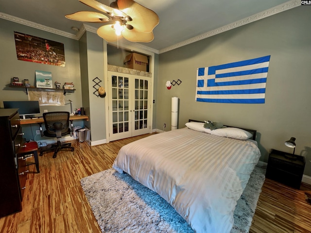 541 Georgia St, Columbia, SC 29201 - bedroom featuring a ceiling fan, wood finished floors, baseboards, ornamental molding, and french doors