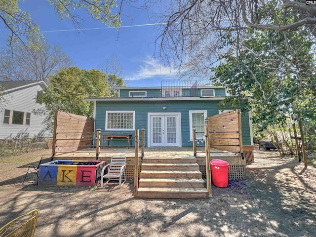 541 Georgia St, Columbia, SC 29201 - rear view of property with french doors, a wooden deck, and fence