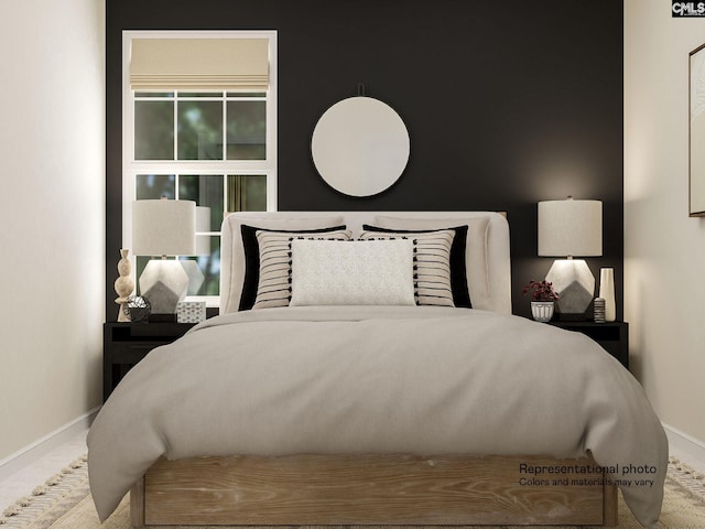 carpeted bedroom with baseboards