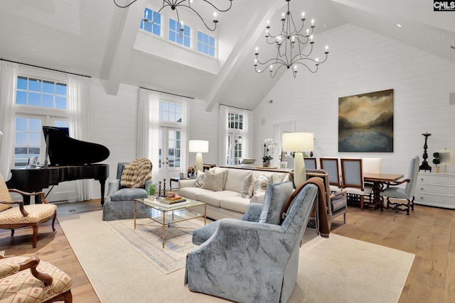 536 Yachting Rd, Lexington, SC 29072 - living area featuring a wealth of natural light, high vaulted ceiling, an inviting chandelier, and light wood-style flooring