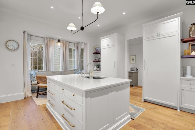 536 Yachting Rd, Lexington, SC 29072 - kitchen with white cabinetry, open shelves, light wood finished floors, and a sink
