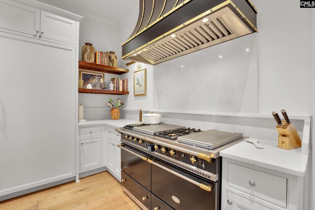 536 Yachting Rd, Lexington, SC 29072 - kitchen featuring double oven range, open shelves, light wood-style flooring, white cabinetry, and exhaust hood