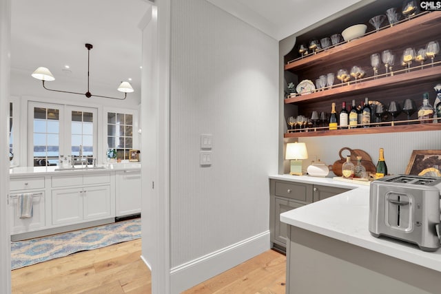 536 Yachting Rd, Lexington, SC 29072 - bar featuring a sink, dishwasher, light wood-style flooring, and a toaster