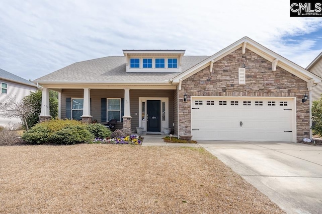 craftsman inspired home with driveway, stone siding, covered porch, an attached garage, and a shingled roof