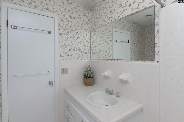 1632 Romain Dr, Columbia, SC 29210 - bathroom featuring a wainscoted wall, tile walls, vanity, and wallpapered walls