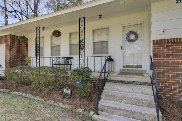 1632 Romain Dr, Columbia, SC 29210 - doorway to property with brick siding and covered porch