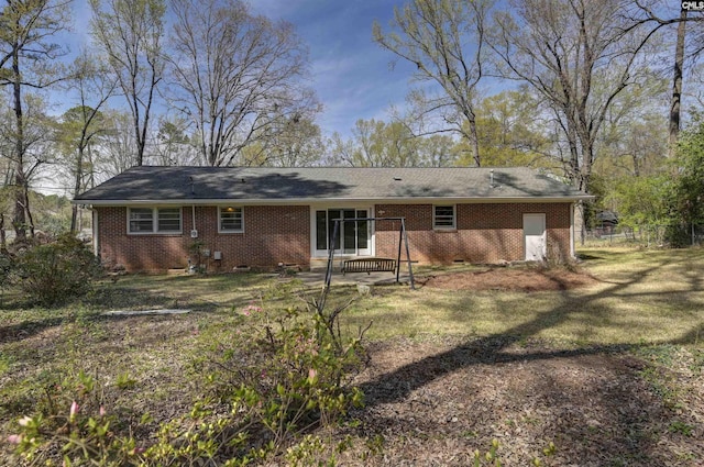 1632 Romain Dr, Columbia, SC 29210 - rear view of house with brick siding, a patio area, and fence