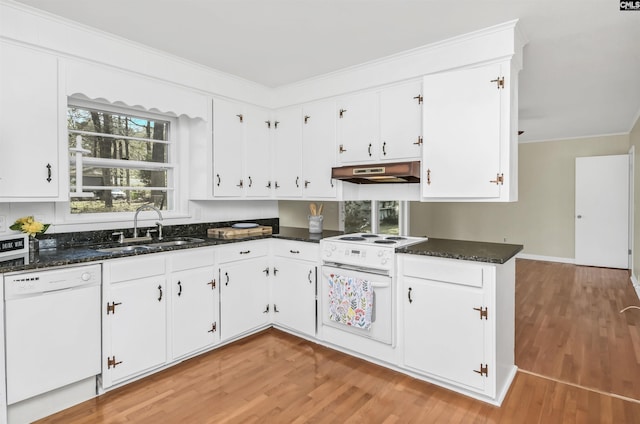 1632 Romain Dr, Columbia, SC 29210 - kitchen featuring crown molding, under cabinet range hood, white appliances, white cabinetry, and a sink