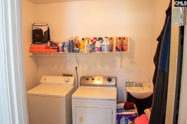 212/210 Nash Rd, Bishopville, SC 29010 - laundry area featuring a sink, laundry area, and washing machine and clothes dryer