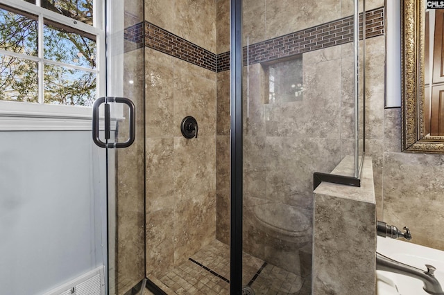 bathroom with a stall shower
