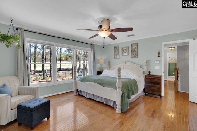 538 Wateroak Trl, Chapin, SC 29036 - bedroom with visible vents, crown molding, light wood-type flooring, and a ceiling fan
