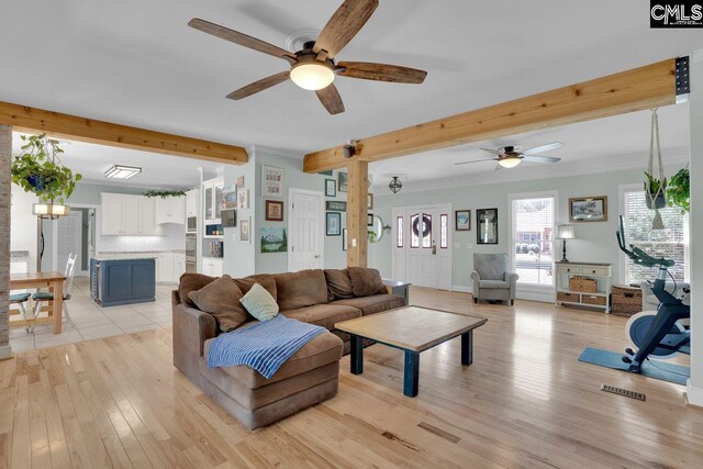 538 Wateroak Trl, Chapin, SC 29036 - living room with crown molding, beamed ceiling, light wood finished floors, visible vents, and a ceiling fan