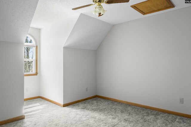 640 Windy Rd, Gilbert, SC 29054 - additional living space featuring lofted ceiling, baseboards, a textured ceiling, carpet floors, and ceiling fan