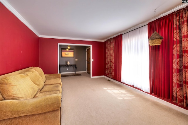living area featuring carpet flooring, crown molding, and baseboards