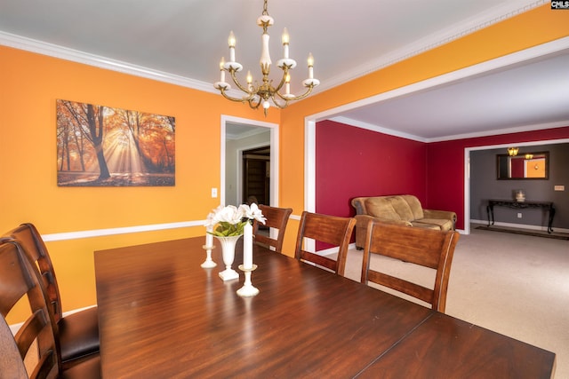 dining room featuring baseboards, crown molding, and an inviting chandelier