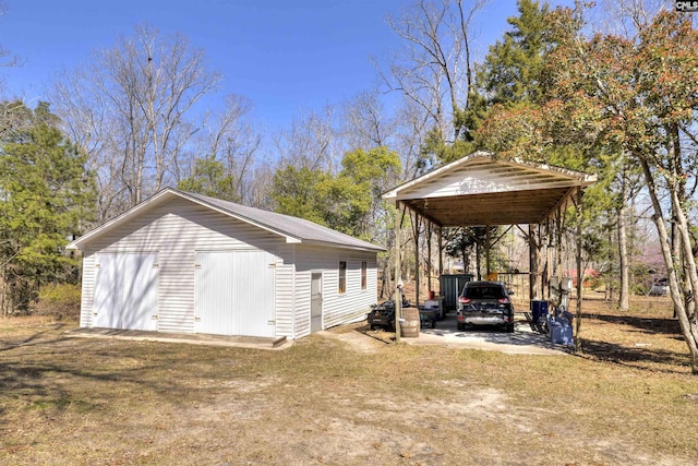 view of outbuilding featuring an outbuilding and a detached carport