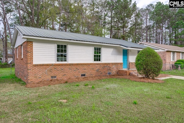 4104 Candlelite Dr, Columbia, SC 29209 - ranch-style house with fence, metal roof, crawl space, a front lawn, and brick siding