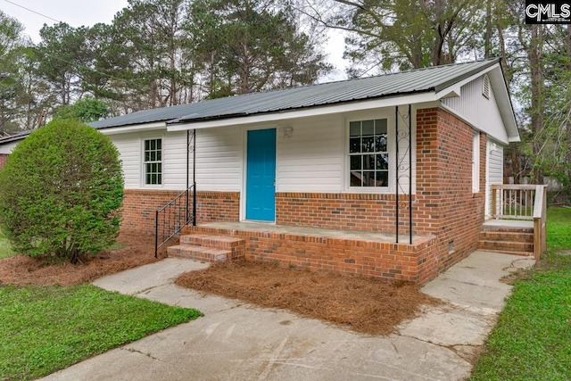 4104 Candlelite Dr, Columbia, SC 29209 - single story home featuring brick siding, metal roof, and crawl space