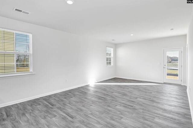 130 Shumard Ct, Columbia, SC 29203 - empty room with wood finished floors, recessed lighting, baseboards, and visible vents