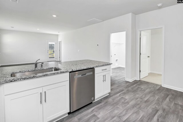 130 Shumard Ct, Columbia, SC 29203 - kitchen featuring white cabinets, visible vents, a sink, light wood-style floors, and stainless steel dishwasher