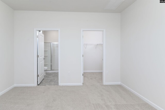 130 Shumard Ct, Columbia, SC 29203 - unfurnished bedroom featuring a spacious closet, carpet floors, baseboards, and visible vents