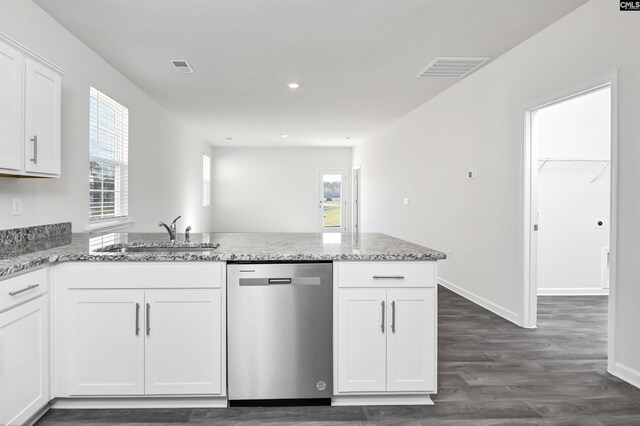 130 Shumard Ct, Columbia, SC 29203 - kitchen featuring stainless steel dishwasher, a sink, light stone counters, white cabinets, and a peninsula