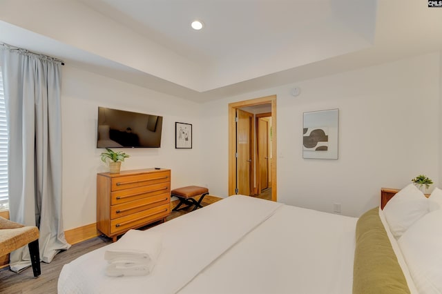 bedroom featuring light wood-style flooring and recessed lighting