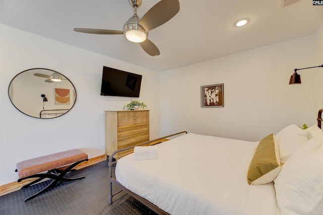 bedroom with baseboards, recessed lighting, and a ceiling fan