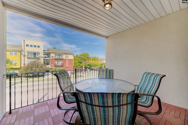 balcony featuring outdoor dining area