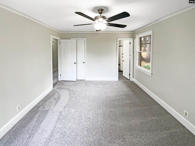 unfurnished bedroom featuring baseboards and ornamental molding