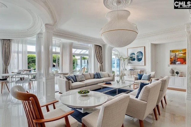 living room with ornate columns