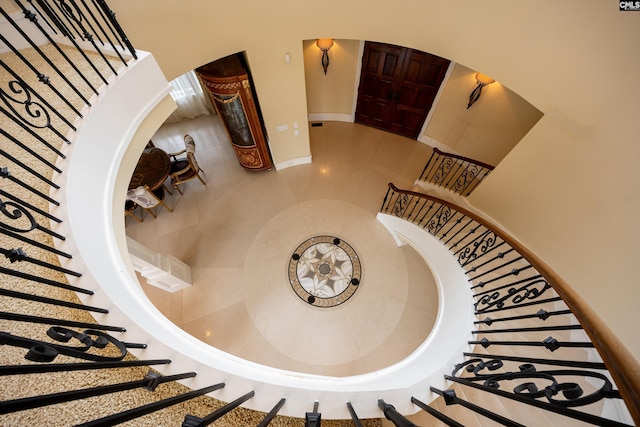 stairs featuring baseboards