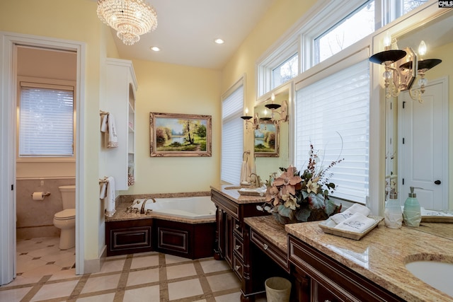 full bathroom with toilet, vanity, recessed lighting, and an inviting chandelier