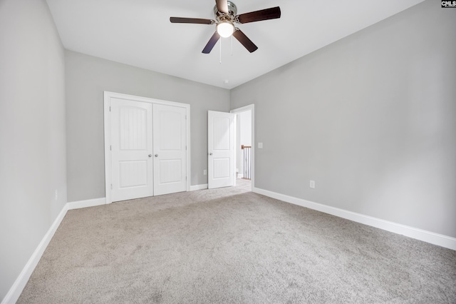 193 Peppermint Ln, Blythewood, SC 29016 - unfurnished bedroom with a closet, baseboards, a ceiling fan, and carpet floors