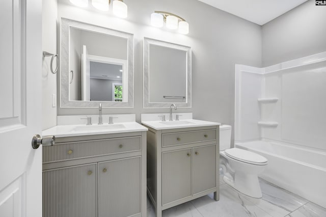 193 Peppermint Ln, Blythewood, SC 29016 - bathroom featuring toilet, two vanities, a sink, and marble finish floor