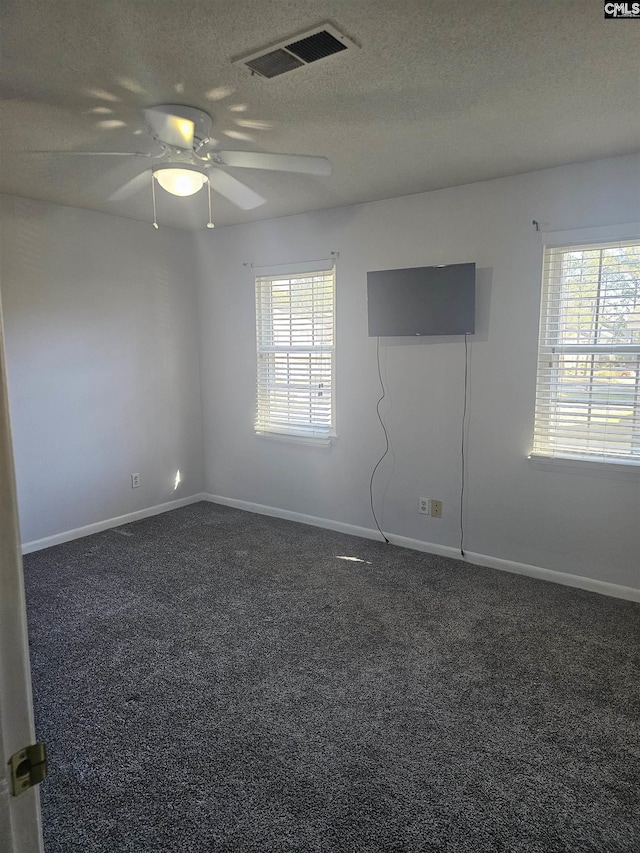 320 Cambout St, Columbia, SC 29210 - unfurnished room featuring baseboards, visible vents, and dark carpet