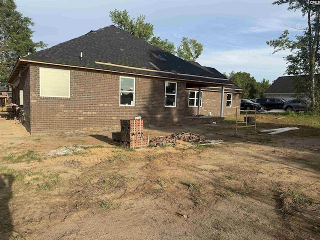 1270 Sandpiper Dr, Sumter, SC 29154 - back of house with brick siding and roof with shingles