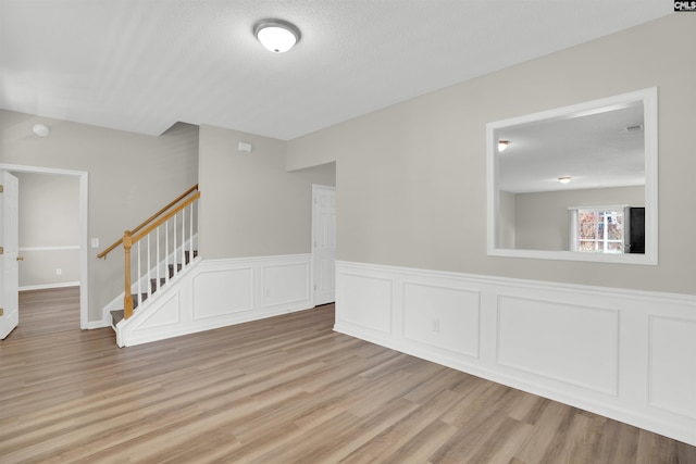 1827 Lake Carolina Dr, Columbia, SC 29229 - empty room with stairs and light wood-type flooring