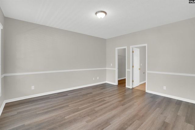 1827 Lake Carolina Dr, Columbia, SC 29229 - unfurnished room with baseboards and wood finished floors