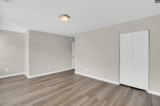 1827 Lake Carolina Dr, Columbia, SC 29229 - interior space featuring baseboards, a closet, and wood finished floors