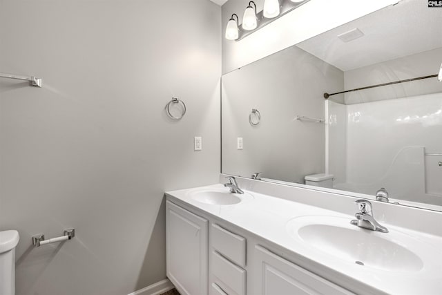 1827 Lake Carolina Dr, Columbia, SC 29229 - full bath with double vanity, a sink, and toilet
