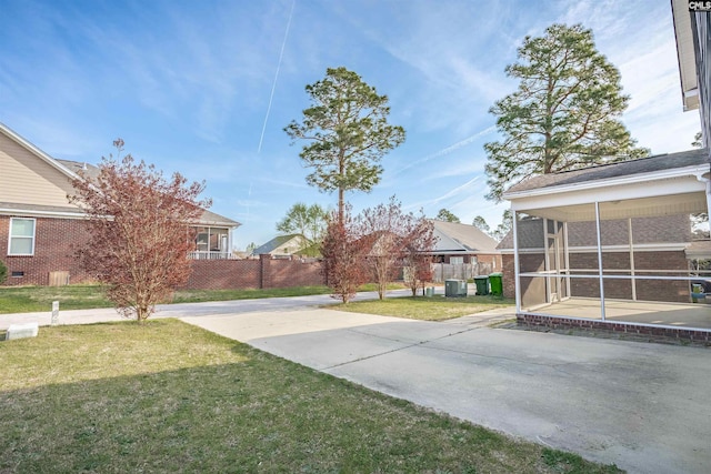 1827 Lake Carolina Dr, Columbia, SC 29229 - view of yard featuring cooling unit, a sunroom, and fence