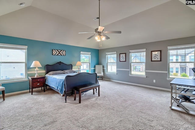 carpeted bedroom featuring baseboards, lofted ceiling, visible vents, and a ceiling fan