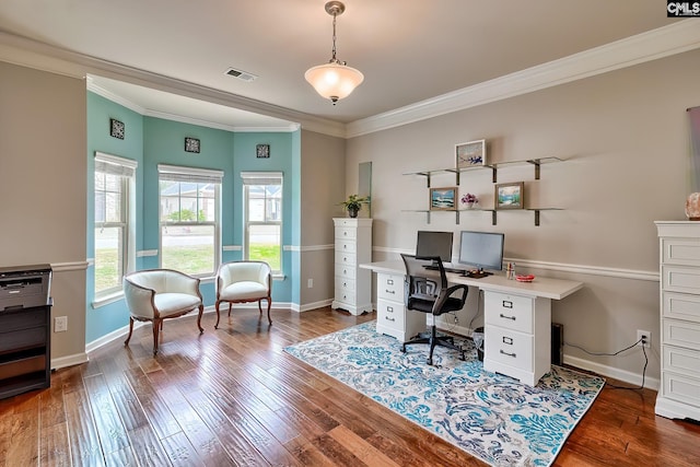 office area featuring baseboards, wood finished floors, and ornamental molding