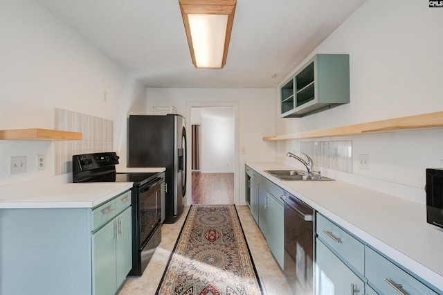 113 Silverstone Rd, Lexington, SC 29072 - kitchen featuring green cabinets, a sink, stainless steel appliances, and open shelves