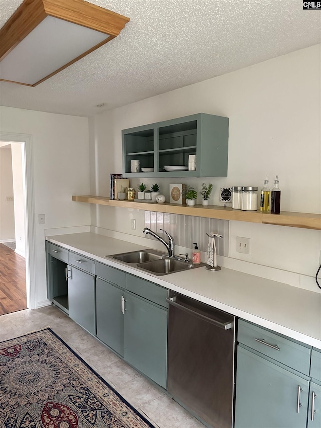 113 Silverstone Rd, Lexington, SC 29072 - kitchen featuring light countertops, open shelves, a textured ceiling, stainless steel dishwasher, and a sink
