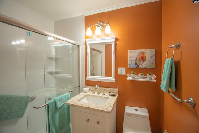 full bathroom with a shower stall, toilet, and vanity