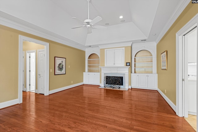 unfurnished living room featuring built in features, light wood-style flooring, baseboards, and a ceiling fan