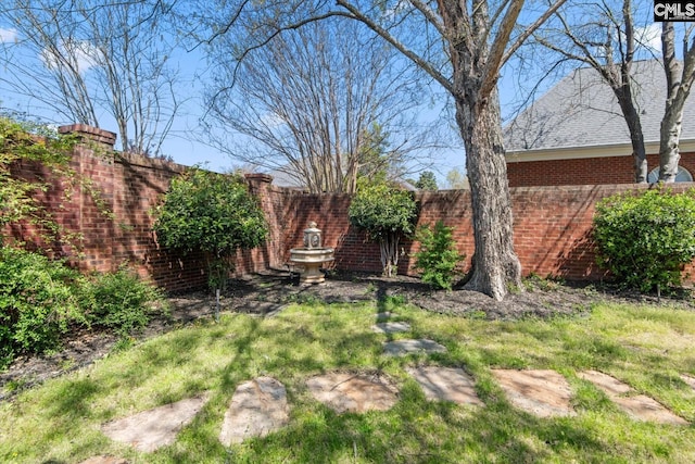 view of yard with fence