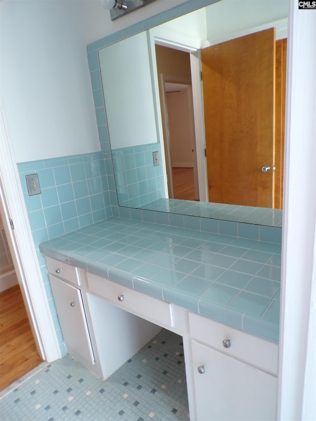 302 Baskin Ave, Bishopville, SC 29010 - bathroom with tile patterned floors and vanity